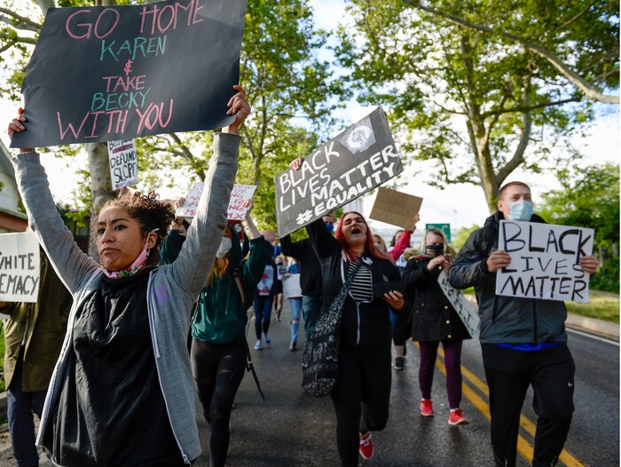 (Leah Hogsten  |  The Salt Lake Tribune) Demonstrators marched from the Utah Capitol down State Street, stopping at every intersection for five minutes in honor of George Floyd, June 8, 2020.