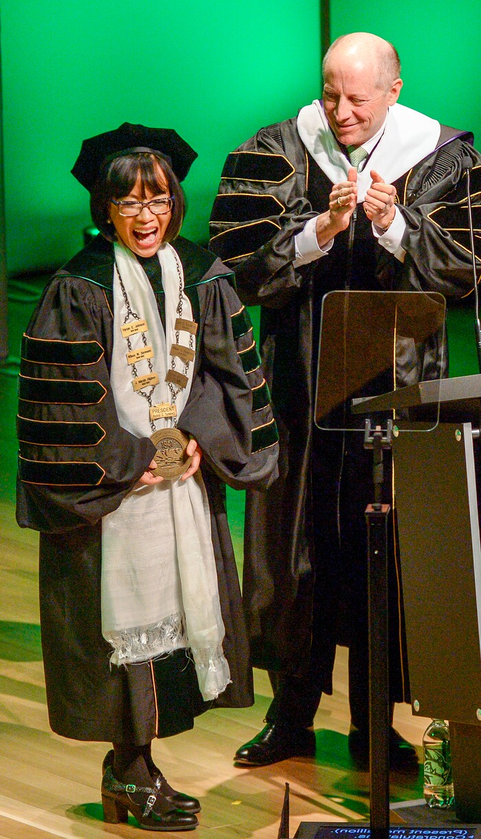Leah Hogsten  |  The Salt Lake Tribune  Harris Simmons, chairman of the Utah State Board of Regents laughs as newly inaugurated Utah Valley University president Astrid Tuminez shows her excitement at becoming UVU's first female president Wednesday. Astrid Tuminez became the university's seventh president, March 27, 2019 and will oversee a campus of over 37,000 students with a top-tier teaching program, a competitive business school and a popular open admissions policy. Born and raised in the Philippines, she has a bachelor's degree from Brigham Young University, a master's degree from Harvard University and a doctorate from Massachusetts Institute of Technology.