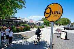 (Francisco Kjolseth  | The Salt Lake Tribune) People enjoy a sunny Saturday on 900 South near 300 East in Salt Lake City, May 10, 2025. This stretch of 900 South is developing into a lively district with shops, salons and restaurants along the 9 Line Trail.