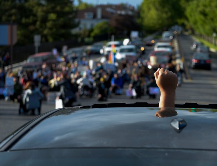 (Leah Hogsten  |  The Salt Lake Tribune) Demonstrators marched from the Utah Capitol down State Street, stopping at every intersection for five minutes in honor of George Floyd, June 8, 2020.