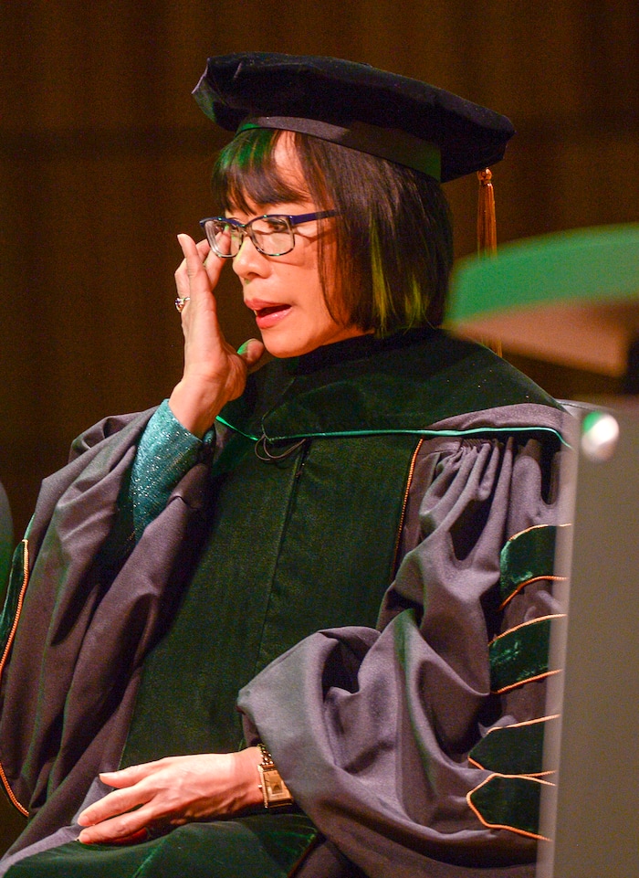 Leah Hogsten  |  The Salt Lake Tribune  Utah Valley University president Astrid Tuminez wipes away tears during her presidential inauguration, becoming UVU's first female president Wednesday. Astrid Tuminez became the university's seventh president, March 27, 2019 and will oversee a campus of over 37,000 students with a top-tier teaching program, a competitive business school and a popular open admissions policy. Born and raised in the Philippines, she has a bachelor's degree from Brigham Young University, a master's degree from Harvard University and a doctorate from Massachusetts Institute of Technology.