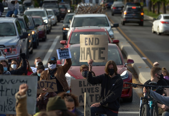 (Leah Hogsten  |  The Salt Lake Tribune) Demonstrators marched from the Utah Capitol down State Street, stopping at every intersection for five minutes in honor of George Floyd, June 8, 2020.