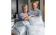 (Kim Raff | The New York Times) Ali and Ben Larsen ,founders of Celestial Recycling, a business that allows Latter-day Saints to discard their religious garments, in Plain City on May 12, 2025.