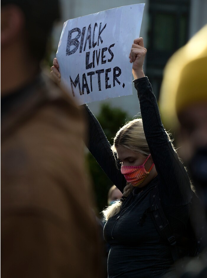 (Leah Hogsten  |  The Salt Lake Tribune) Demonstrators marched from the Utah Capitol down State Street, stopping at every intersection for five minutes in honor of George Floyd, June 8, 2020.
